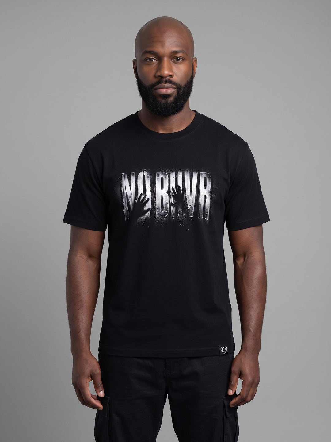 Condensation Hands Tee in black, front view on a model – NO BHVR