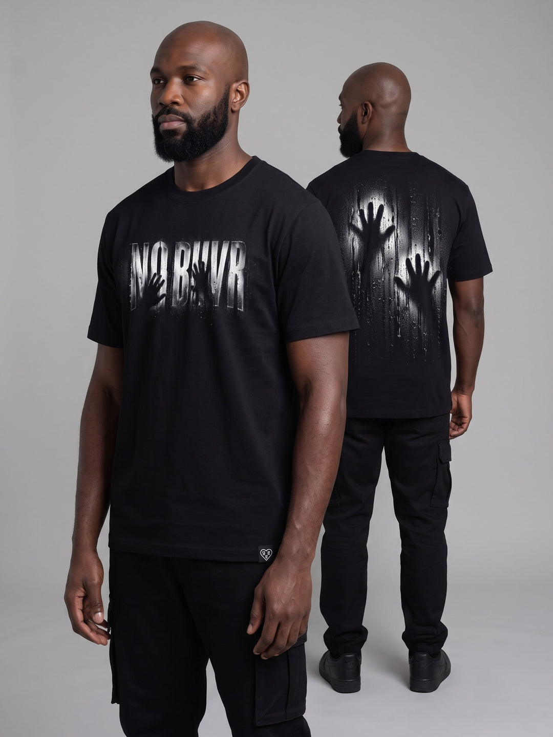 Condensation Hands Tee in black, side angle on a model – NO BHVR
