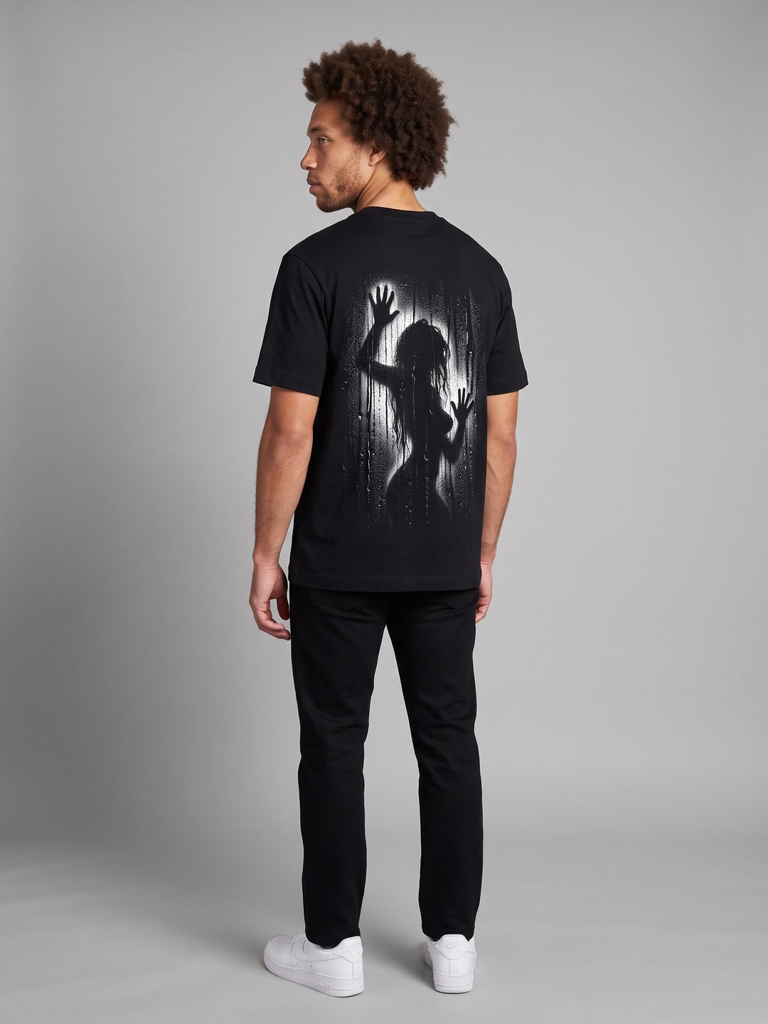 Condensation Lady Tee in black, back view on a model – NO BHVR