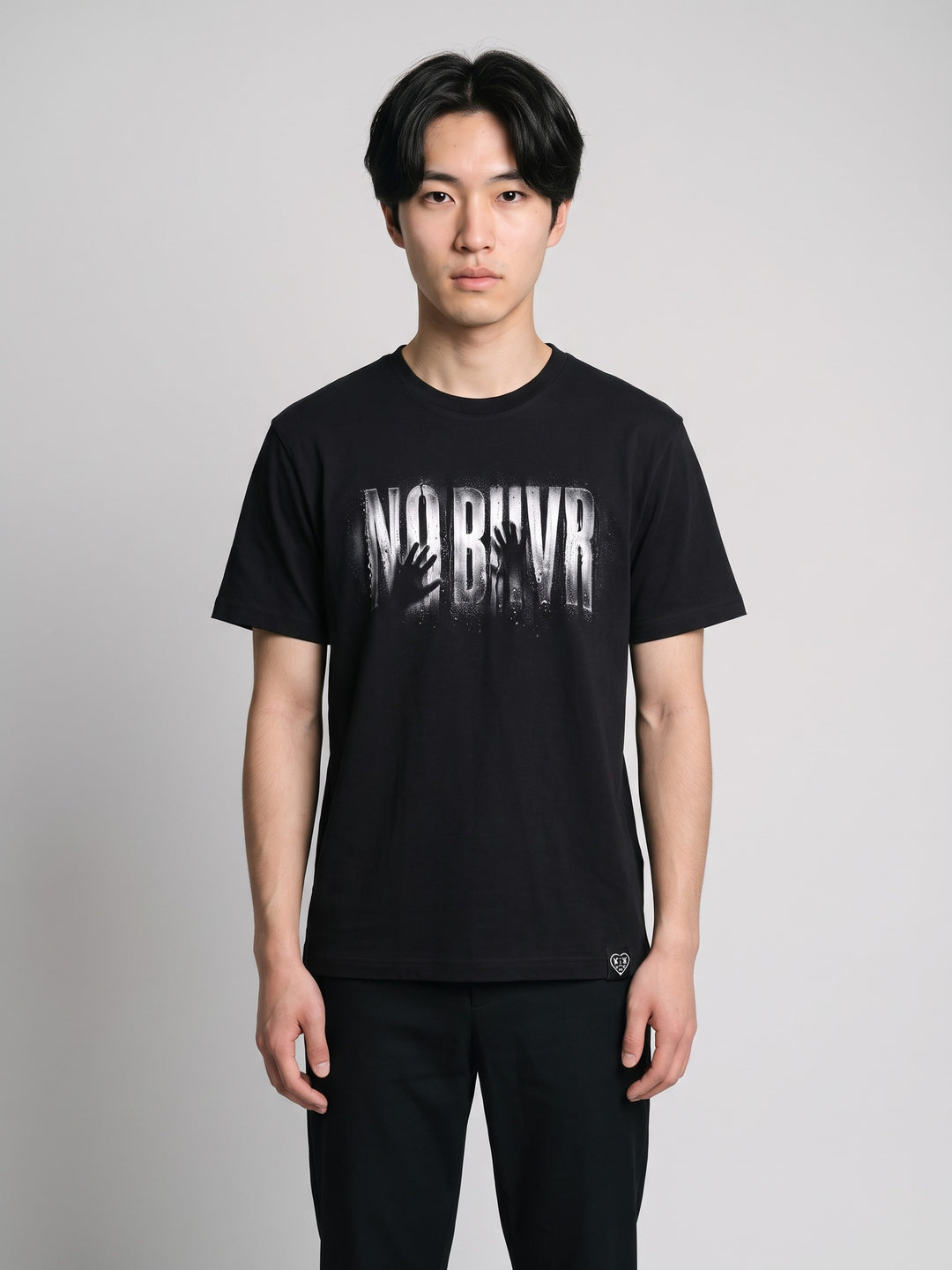 Condensation Man Tee in black, front view on a model – NO BHVR