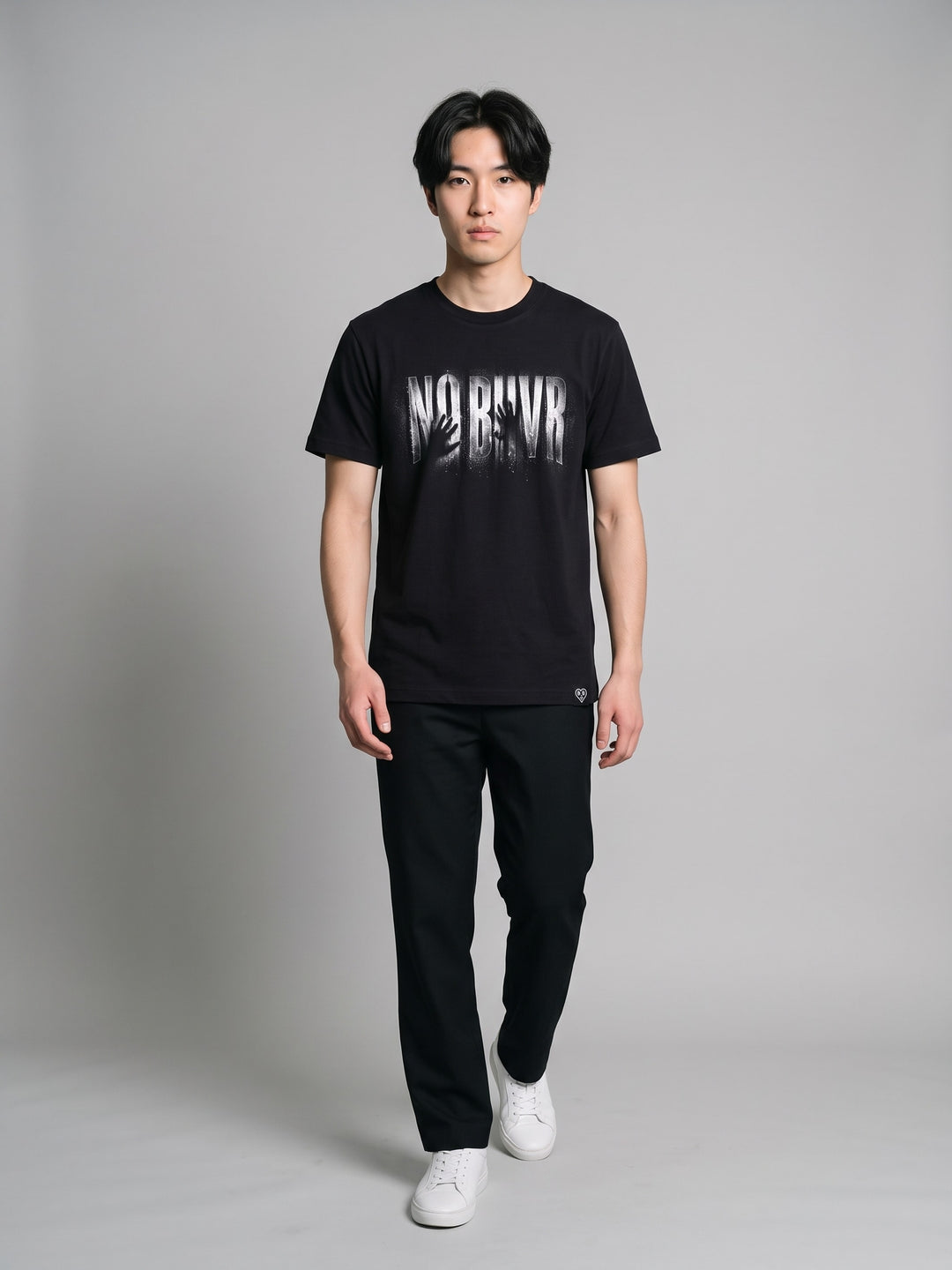 Condensation Man Tee in black, on a model, walking – NO BHVR
